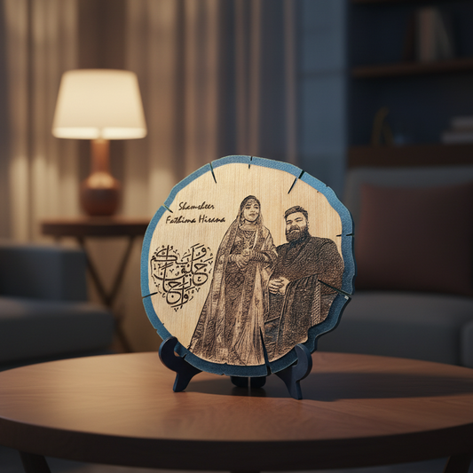 Decorative wooden plaque with engraved couple on a table in a living room setting.